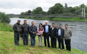 John Evans shows Chinese delegates around the Red Rooster site in Aberdeen.